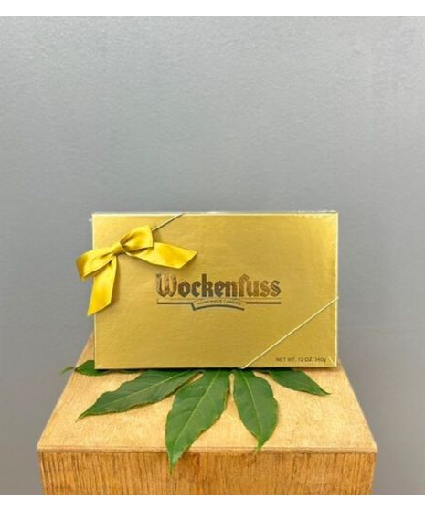 Indulge in a delightful treat with Wockenfuss's 12oz box of assorted milk and dark chocolates.