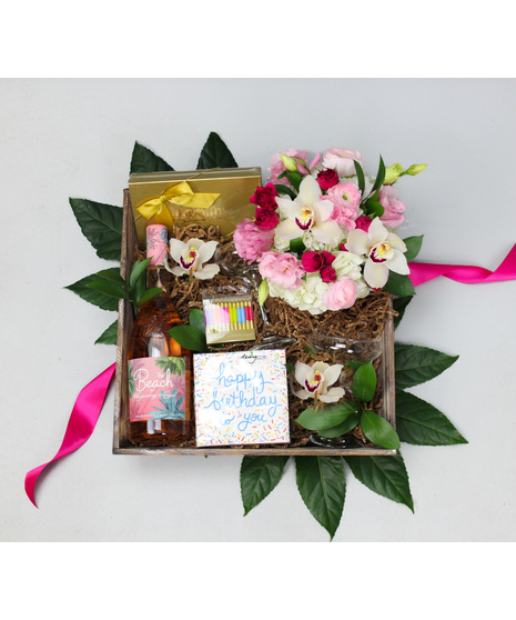 The perfect birthday crate! A beautiful arrangement accompanied by all of the birthday essentials!